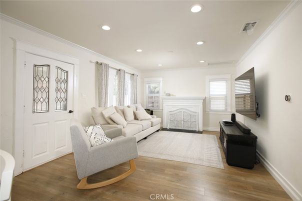 Fireplace, Interior, Living room, Recessed Lighting, Wood Texture Flooring