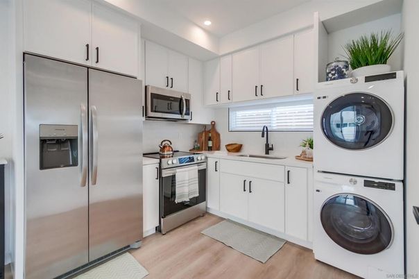 Interior, Kitchen, Recessed Lighting, Stainless Steel Appliances, Washer, Wood Texture Flooring