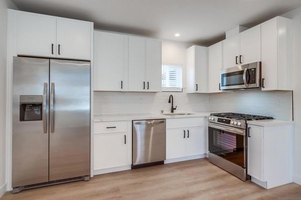 Interior, Kitchen, Recessed Lighting, Stainless Steel Appliances, Wood Texture Flooring