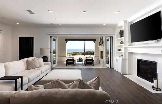Fireplace, Interior, Living room, Recessed Lighting, Water, Wood Texture Flooring