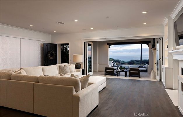 Fireplace, Interior, Living room, Recessed Lighting, Water, Wood Texture Flooring