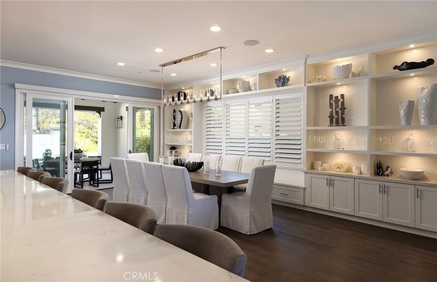 Dining room, Fireplace, Interior, Pendant Lights, Recessed Lighting, Wood Texture Flooring