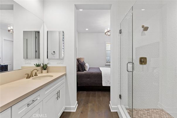 Bathroom, Bedroom, Dual Sink Vanities, Glass Shower, Interior, Recessed Lighting, Wood Texture Flooring