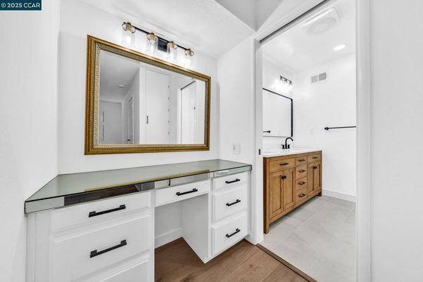 Bathroom, Dual Sink Vanities, Interior, Recessed Lighting, Wood Texture Flooring