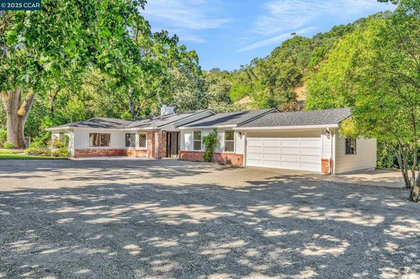 Attached, Backyard, Exterior, Facade, Brick Facade, Ranch