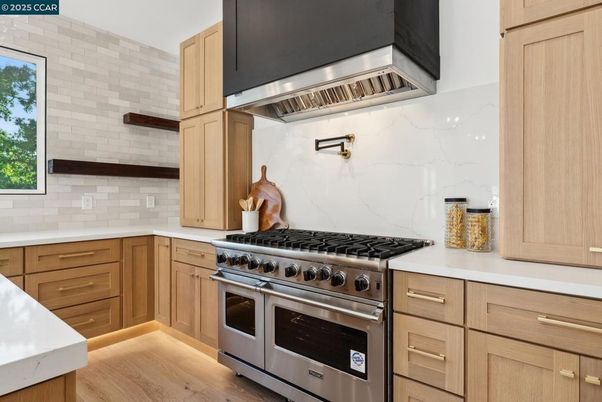 Interior, Kitchen, Marble Walls, Stainless Steel Appliances, Wood Texture Flooring