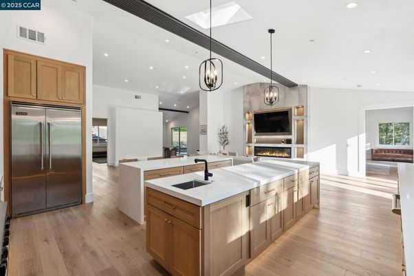 Fireplace, Interior, Kitchen, Pendant Lights, Recessed Lighting, Stainless Steel Appliances, Wood Texture Flooring
