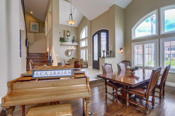 Dining room, Interior, Pendant Lights, Piano, Recessed Lighting, Wood Texture Flooring