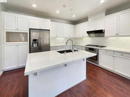 Interior, Kitchen, Recessed Lighting, Stainless Steel Appliances, Wood Texture Flooring