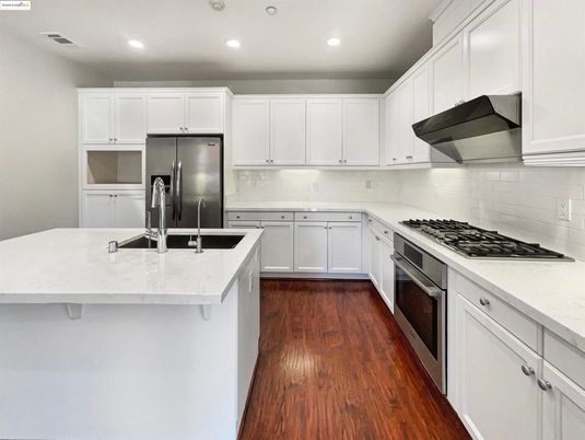 Interior, Kitchen, Recessed Lighting, Stainless Steel Appliances, Wood Texture Flooring
