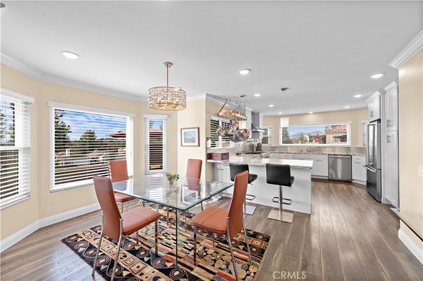 Dining room, Interior, Kitchen, Pendant Lights, Recessed Lighting, Stainless Steel Appliances, Wood Texture Flooring