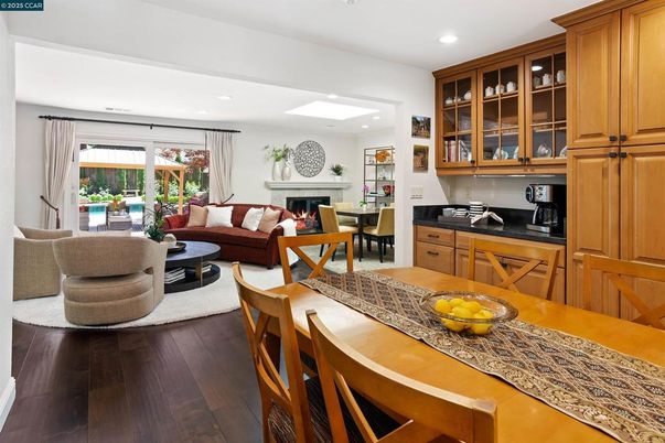 Dining room, Fireplace, Interior, Living room, Recessed Lighting, Wood Texture Flooring