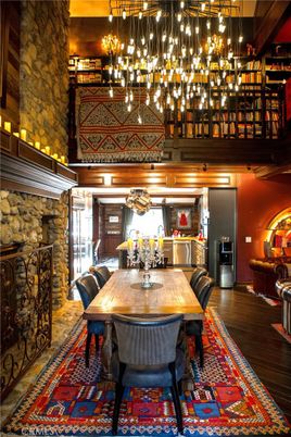Dining room, Fireplace, Interior, Pendant Lights, Stone Walls, Wood Texture Flooring
