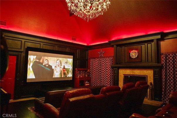 Chandelier, Fireplace, Interior, Projection Screen, Recessed Lighting, Theatre Room