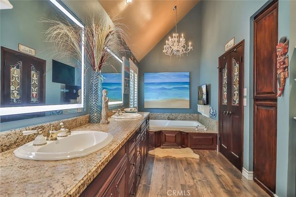 Bathroom, Chandelier, Dual Sink Vanities, Interior, Recessed Lighting, Wood Texture Flooring