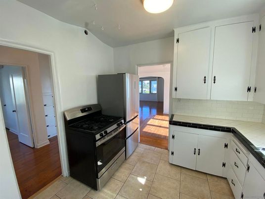 Interior, Kitchen, Tile Countertops, Wood Texture Flooring