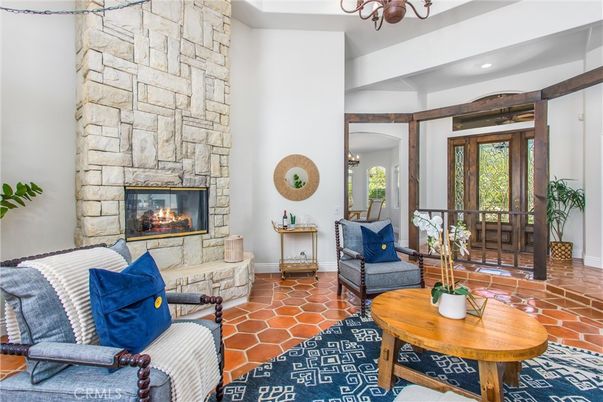 Chandelier, Fireplace, Interior, Living room, Recessed Lighting, Stone Walls