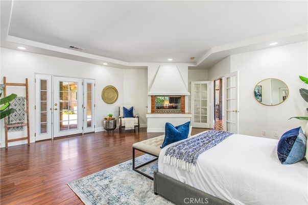Bedroom, Fireplace, Interior, Recessed Lighting, Wood Texture Flooring