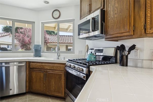 Interior, Kitchen, Recessed Lighting, Stainless Steel Appliances, Tile Countertops