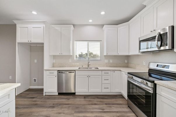 Interior, Kitchen, Recessed Lighting, Stainless Steel Appliances, Wood Texture Flooring