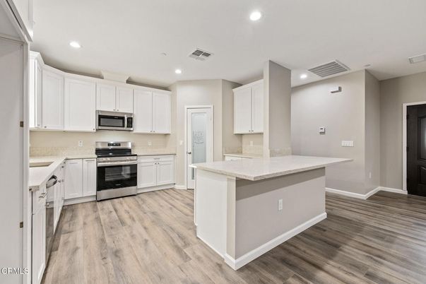Interior, Kitchen, Recessed Lighting, Stainless Steel Appliances, Wood Texture Flooring