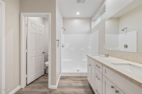 Bathroom, Dual Sink Vanities, Interior, Recessed Lighting, Wood Texture Flooring