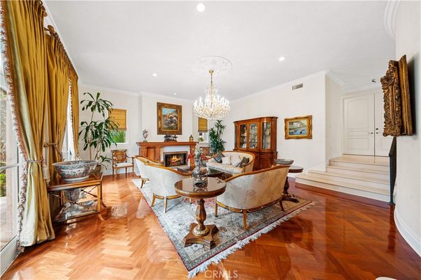Chandelier, Fireplace, Interior, Living room, Recessed Lighting, Wood Texture Flooring
