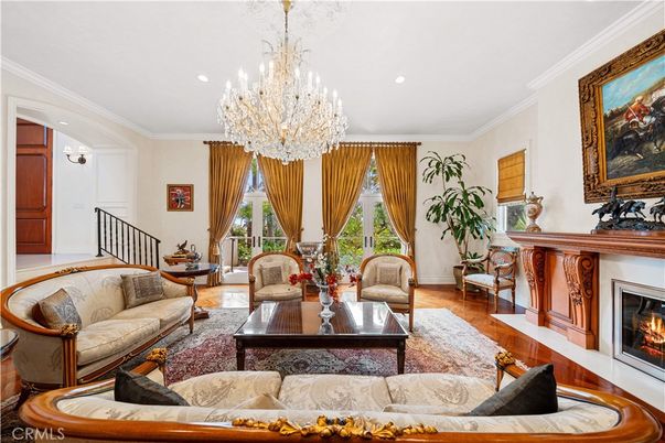 Chandelier, Fireplace, Interior, Living room, Recessed Lighting, Wood Texture Flooring
