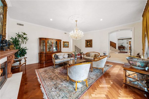 Chandelier, Fireplace, Interior, Living room, Recessed Lighting, Wood Texture Flooring