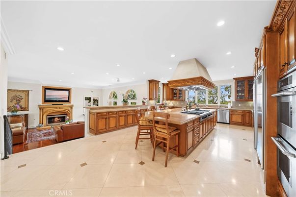 Dining room, Fireplace, Interior, Kitchen, Living room, Recessed Lighting, Stainless Steel Appliances