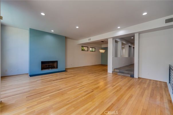 Empty room, Fireplace, Interior, Pendant Lights, Recessed Lighting, Wood Texture Flooring