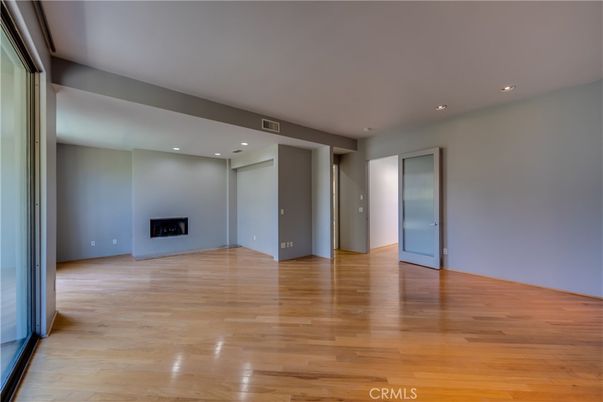 Empty room, Fireplace, Interior, Recessed Lighting, Wood Texture Flooring