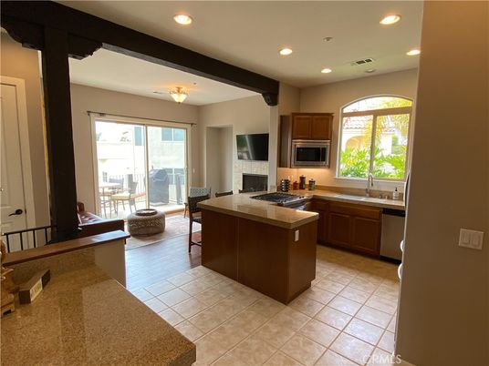 Fireplace, Interior, Kitchen, Recessed Lighting, Stainless Steel Appliances