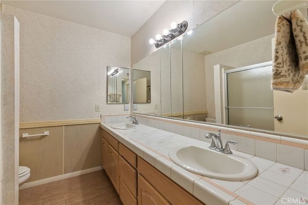 Bathroom, Dual Sink Vanities, Interior, Tile Countertops, Wood Texture Flooring