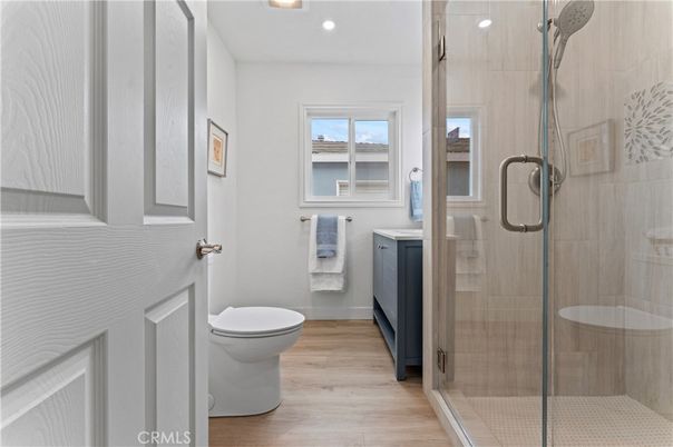 Bathroom, Glass Shower, Interior, Recessed Lighting, Wood Texture Flooring