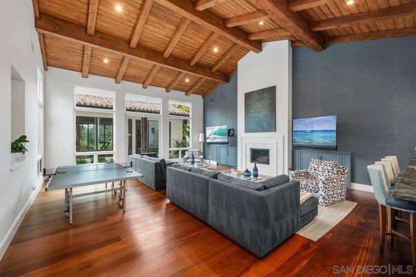 Fireplace, Game Room, Interior, Living room, Recessed Lighting, Wooden Beams, Wooden Ceilings, Wood Texture Flooring