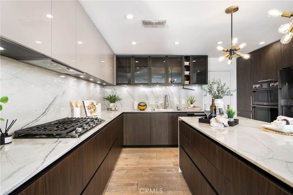 Interior, Kitchen, Marble Walls, Pendant Lights, Recessed Lighting, Wood Texture Flooring