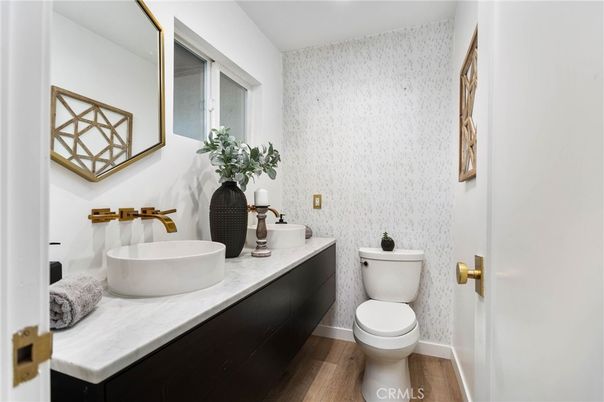 Interior, Kitchen, Marble Walls, Recessed Lighting, Stainless Steel Appliances, Wood Texture Flooring