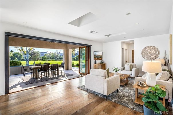 Chandelier, Dining room, Fireplace, Interior, Living room, Recessed Lighting, Stone Walls, Wood Texture Flooring