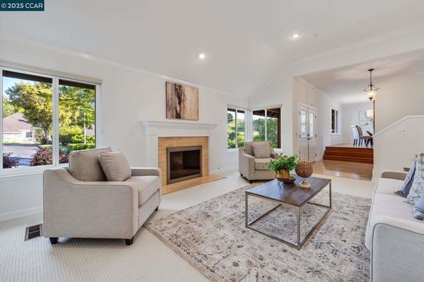 Dining room, Fireplace, Interior, Living room, Pendant Lights, Recessed Lighting, Wood Texture Flooring