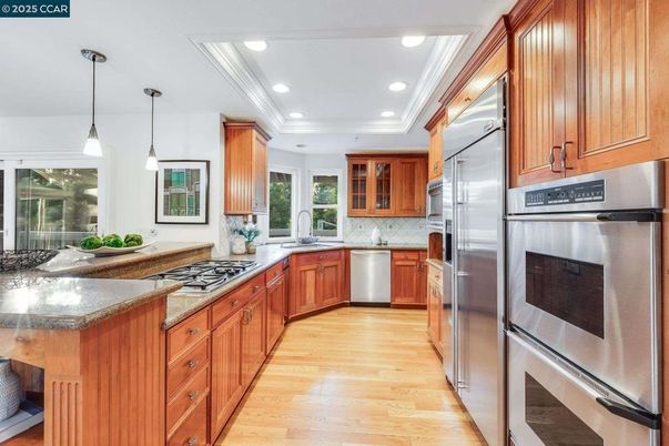Interior, Kitchen, Pendant Lights, Recessed Lighting, Stainless Steel Appliances, Wood Texture Flooring