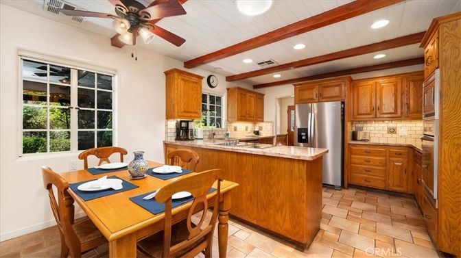 Dining room, Interior, Kitchen, Recessed Lighting, Stainless Steel Appliances, Tile Countertops, Wooden Beams