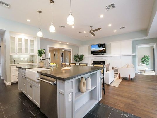 Fireplace, Interior, Kitchen, Living room, Pendant Lights, Recessed Lighting, Stainless Steel Appliances, Wood Texture Flooring