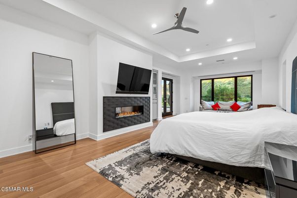 Bedroom, Fireplace, Interior, Recessed Lighting, Wood Texture Flooring