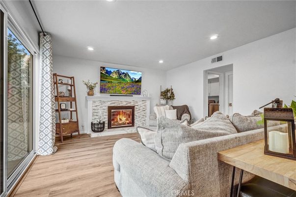 Fireplace, Interior, Living room, Recessed Lighting, Wood Texture Flooring