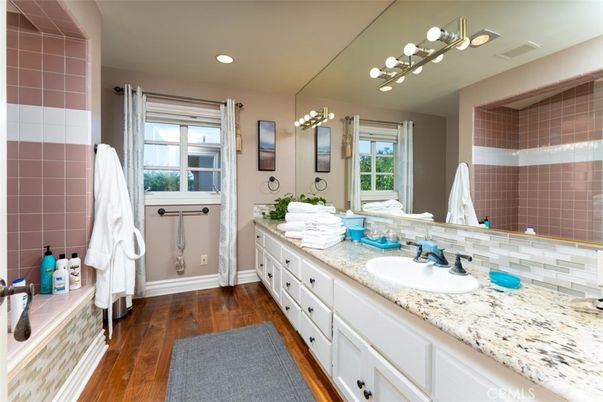 Bathroom, Dual Sink Vanities, Interior, Recessed Lighting, Wood Texture Flooring