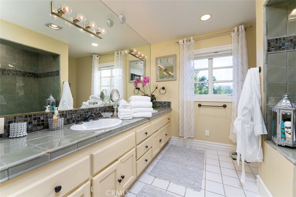 Bathroom, Dual Sink Vanities, Glass Shower, Interior, Recessed Lighting, Tile Countertops