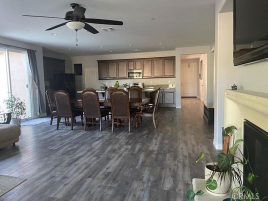 Dining room, Fireplace, Interior, Kitchen, Recessed Lighting, Wood Texture Flooring