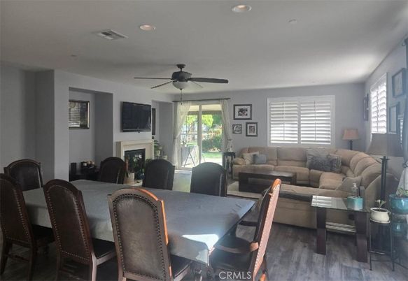 Dining room, Fireplace, Interior, Living room, Recessed Lighting, Wood Texture Flooring