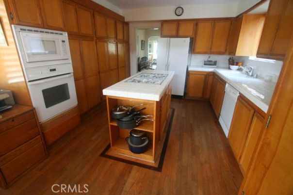 Interior, Kitchen, Recessed Lighting, Tile Countertops, Wood Texture Flooring